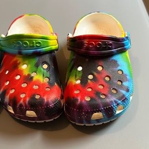 Tie dye Crocs toddler size 8. Small scratch on top.